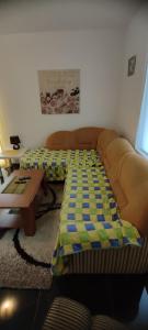 Postel nebo postele na pokoji v ubytování Apartman Kalina