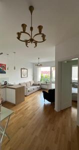Postel nebo postele na pokoji v ubytování Wilanów Garden Apartment