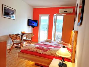 Postel nebo postele na pokoji v ubytování Durakovic Apartments