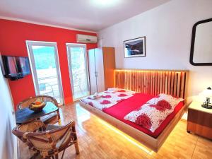 Postel nebo postele na pokoji v ubytování Durakovic Apartments