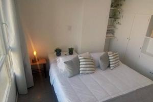 En eller flere senge i et værelse på Bairesmar Aparts - Playa y Sol