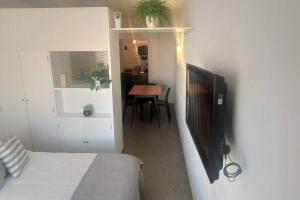 Et tv og/eller underholdning på Bairesmar Aparts - Playa y Sol