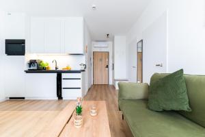 Kuchyň nebo kuchyňský kout v ubytování Sunset Resort, M3 Grzybowo