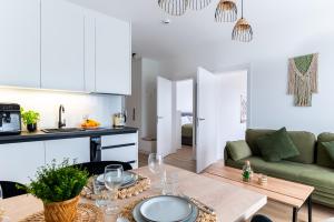 Kuchyň nebo kuchyňský kout v ubytování Sunset Resort, M3 Grzybowo