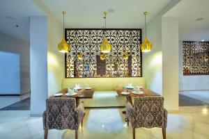 Uma área de estar em Radisson Blu Resort, Fujairah