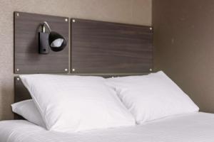 Postel nebo postele na pokoji v ubytování Best Western Plus Park Airport Hotel