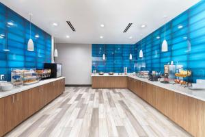 a store with blue walls and wooden counters at Best Western Plus Medical Center in Amarillo