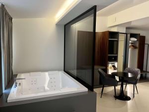 A bed or beds in a room at Best Western Hotel Ferrari