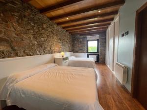 En eller flere senge i et værelse på Casa Ramona en Ribeira Sacra + 47 billeder