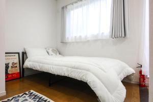 Postel nebo postele na pokoji v ubytování 3, Kameido, Entire house for rent