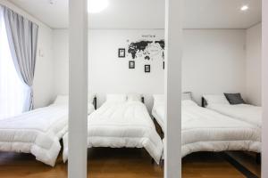 Postel nebo postele na pokoji v ubytování 3, Kameido, Entire house for rent