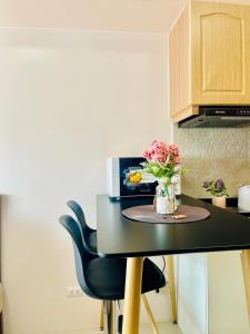 A kitchen or kitchenette at Classy Studio Unit at Aspira Towers