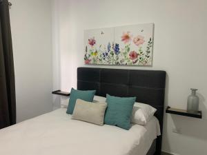 Voodi või voodid majutusasutuse Casa Siguatepeque toas