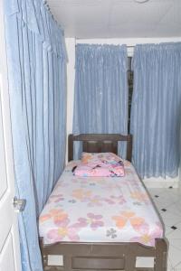 Postel nebo postele na pokoji v ubytování Casa/cabaña de montaña con ambiente fresco