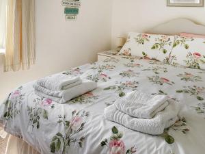 En eller flere senge i et værelse på Dunstanburgh View