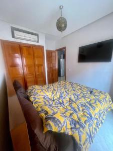 Una cama o camas en una habitación de Résidence Jasmin