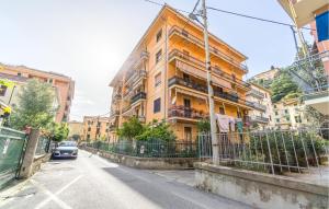 a building with a car parked in front of it at Gorgeous Apartment In Levanto in Levanto +12 photos