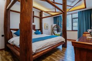 Postel nebo postele na pokoji v ubytování 一树一花客栈眷恋店 + 18 fotografií