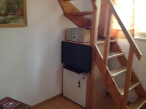TV a/nebo společenská místnost v ubytování La Tourelle