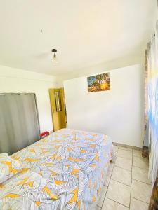 Postel nebo postele na pokoji v ubytování Le Lys de la paix + 4 fotografie