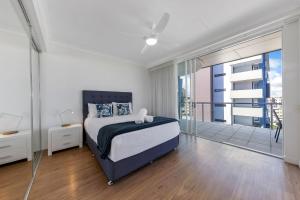 Letto o letti in una camera di Pandanus Mooloolaba