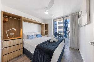 Letto o letti in una camera di Pandanus Mooloolaba
