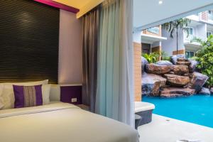 Postel nebo postele na pokoji v ubytování The L Resort, Krabi + 37 fotografií