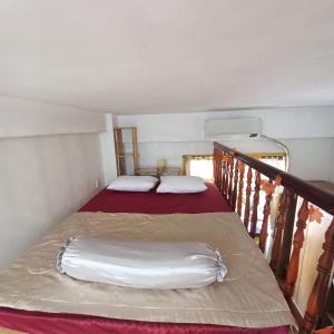 Ένα ή περισσότερα κρεβάτια σε δωμάτιο στο Cute Duplex +2 φωτογραφίες