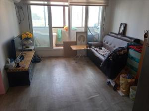 TV a/nebo společenská místnost v ubytování Ocean House - Ipjang