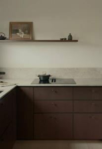 a kitchen counter with a bowl on top of it at The Blackwood House in Rye