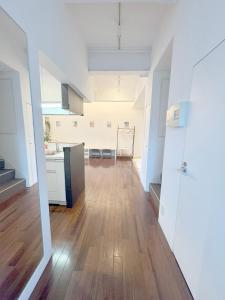 Dapur atau dapur kecil di Bst大阪中心!!! 黒門市場徒歩5分 日本橋駅徒歩10分 道頓堀徒歩15分ホテルリネン使用