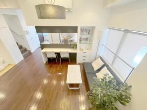 Dapur atau dapur kecil di Bst大阪中心!!! 黒門市場徒歩5分 日本橋駅徒歩10分 道頓堀徒歩15分ホテルリネン使用