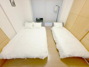 Katil atau katil-katil dalam bilik di Bst大阪中心!!! 黒門市場徒歩5分 日本橋駅徒歩10分 道頓堀徒歩15分ホテルリネン使用
