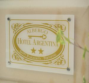 a sign that reads albergo hotel aire institution at Hotel Argentina in Santa Margherita Ligure