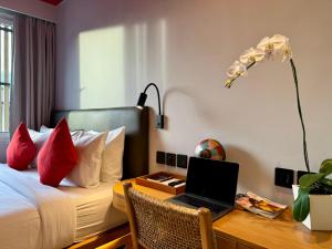 Postel nebo postele na pokoji v ubytování Sokkool Coliving and Coworking