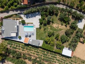 an aerial view of a house with a yard at Angeliana Villa in Angeliana