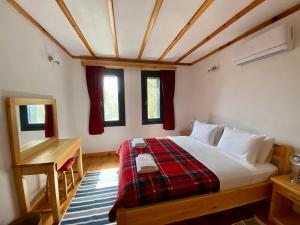 Postel nebo postele na pokoji v ubytování Lamin House
