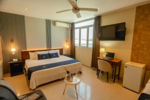 Posteľ alebo postele v izbe v ubytovaní LC Hoteles Piura