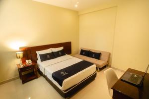 Posteľ alebo postele v izbe v ubytovaní LC Hoteles Piura