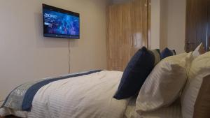 Ένα ή περισσότερα κρεβάτια σε δωμάτιο στο Seaview Apartment, Ikoyi