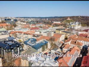 an aerial view of a city with buildings at HaPPy iNN Brilliant Old Town self check in, Underground Parking, Terrace in Vilnius