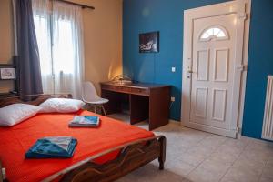 Postel nebo postele na pokoji v ubytování Jimmy's Cozy Apartment