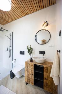 a bathroom with a sink and a mirror at Kurs Siemiany 2 in Siemiany +30 photos