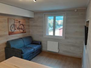Posezení v ubytování Appartement refait à neuf à 10min de Praloup