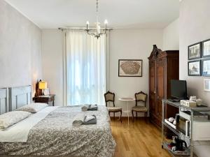 Posteľ alebo postele v izbe v ubytovaní Giulia apartment and room