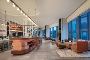上海五角场辉盛坊公寓酒店 - 毗邻商业圈，迷你吧免费的休息区