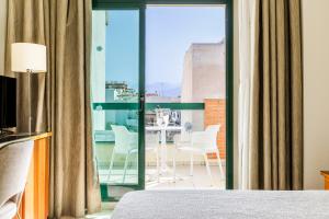 Postel nebo postele na pokoji v ubytování Hotel Torremar - Mares