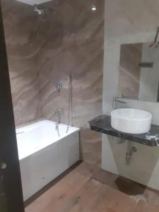 Koupelna v ubytování Hotel Dolphin Residency