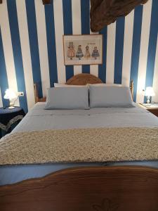 A bed or beds in a room at East Wind