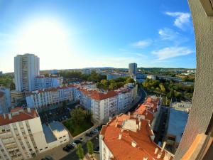 an aerial view of a city with buildings at Lisbon T2 apartment in condominium in Linda-a-Velha Oeiras Lisbon in Linda-a-Velha